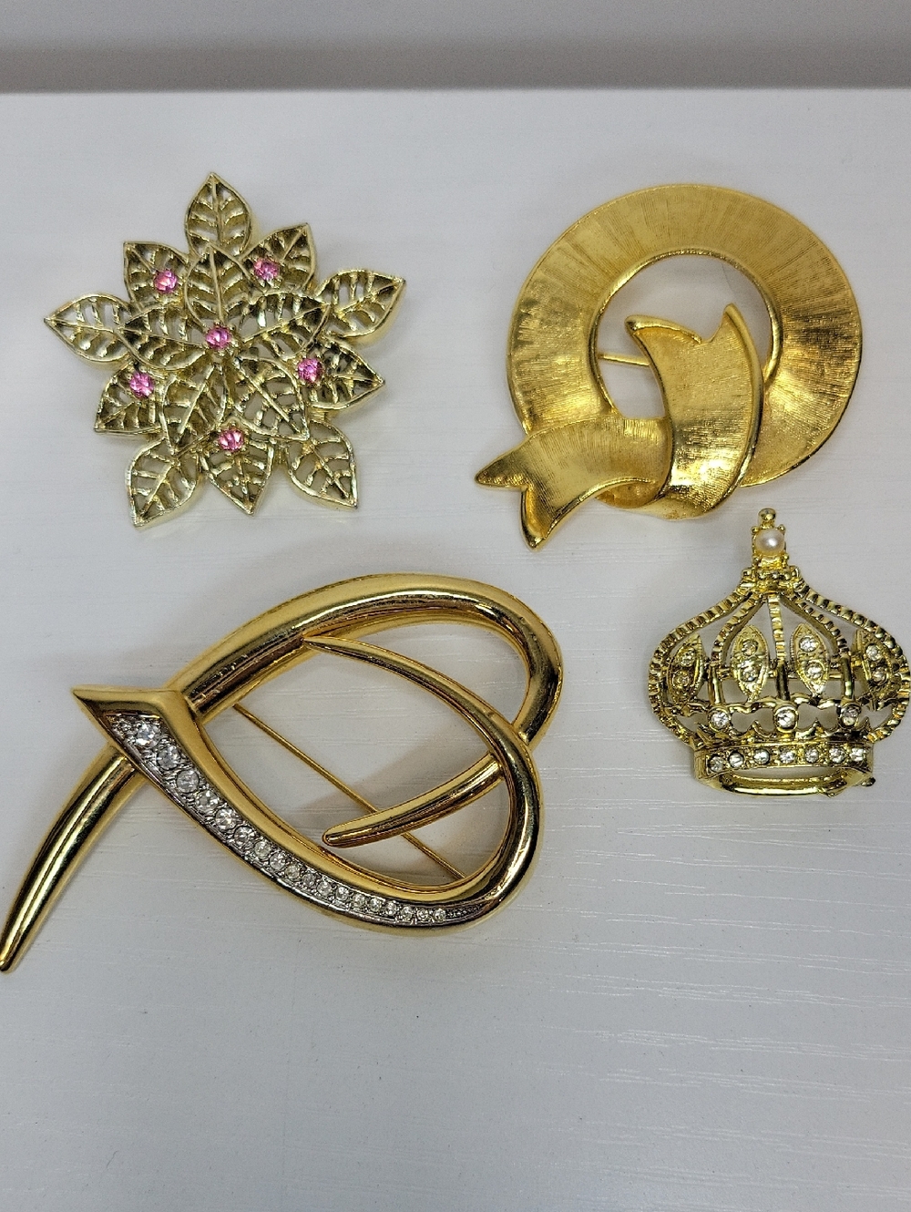 Gold Tone Crown and Leaf Brooch Set